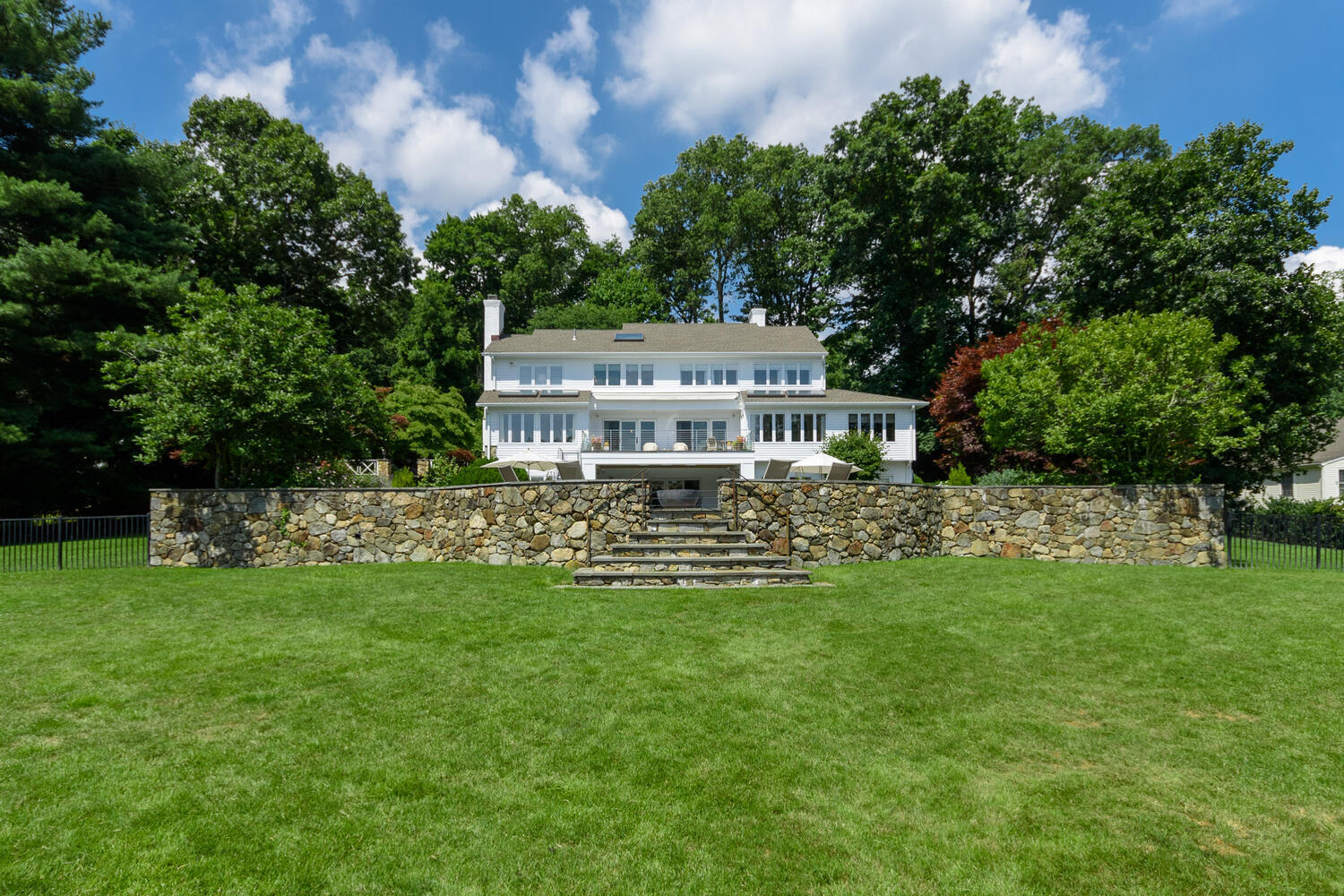 79 Rings End Road Darien, CT 06820 - Photo 36 of 42 a view of a back yard