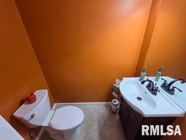 a bedroom with a bed and a tv