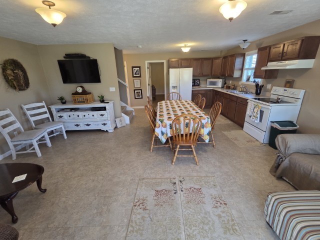 9251 Highway 148 Mount Vernon, IL 62864 - Photo 14 of 68 a living room with furniture and a flat screen tv