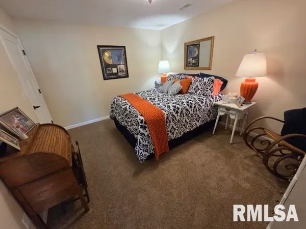 a view of a lake with a big yard