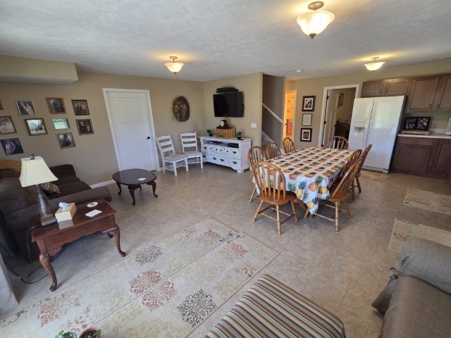 9251 Highway 148 Mount Vernon, IL 62864 - Photo 58 of 68 a living room with furniture and a flat screen tv