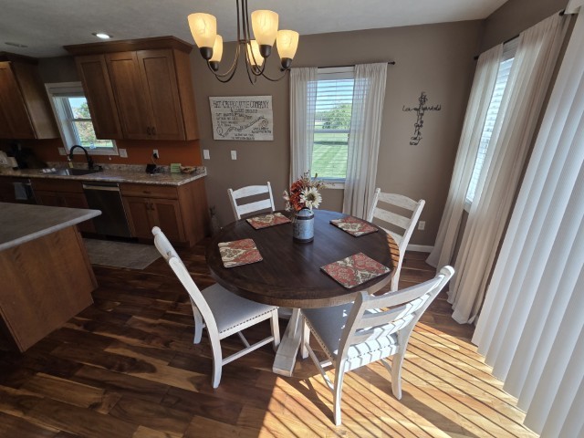 9251 Highway 148 Mount Vernon, IL 62864 - Photo 7 of 68 a view of a dining room with furniture and a chandelier