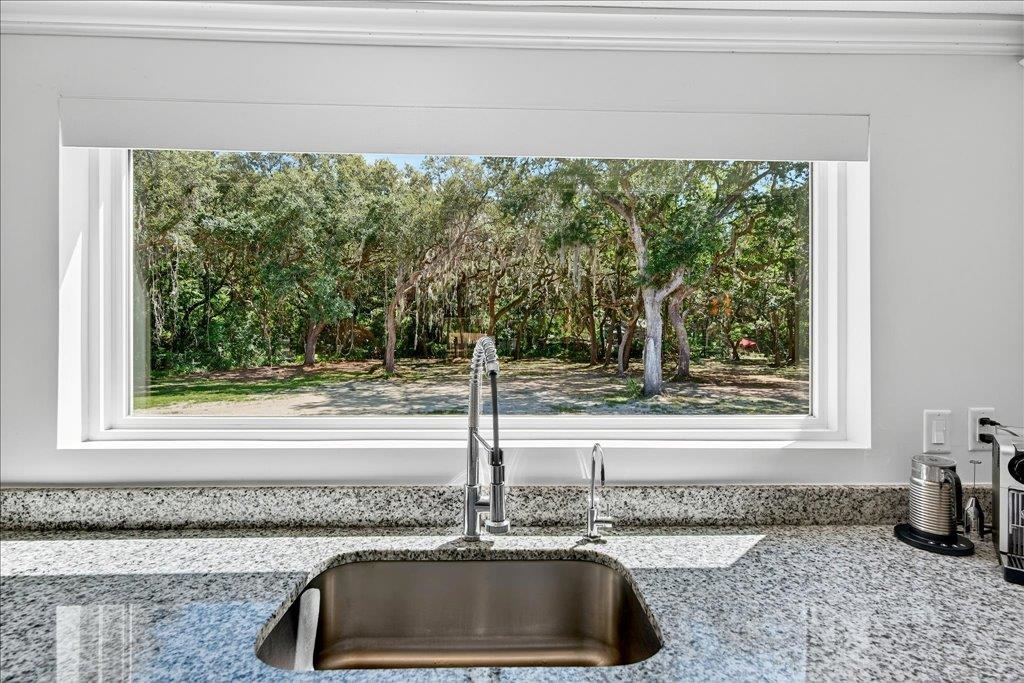361 Coopers Cove Road St. Augustine, FL 32095 - Photo 12 of 35 a bathroom with a sink and a window