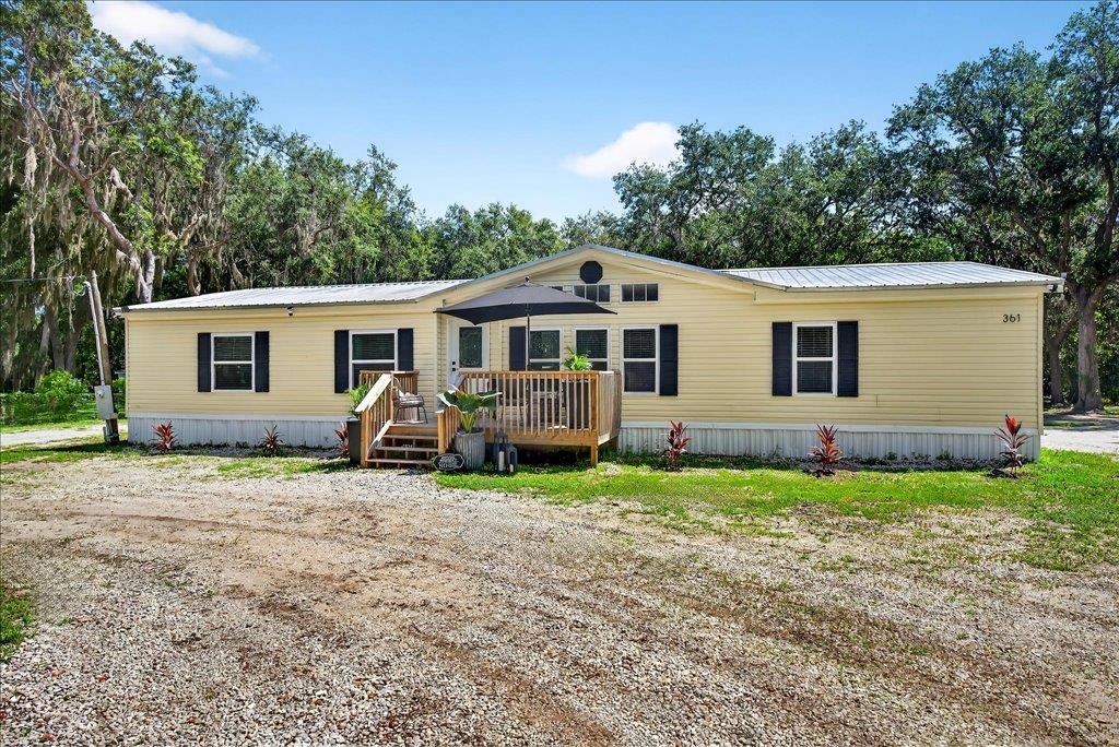 361 Coopers Cove Road St. Augustine, FL 32095 - Photo 32 of 35 a view of a house with backyard