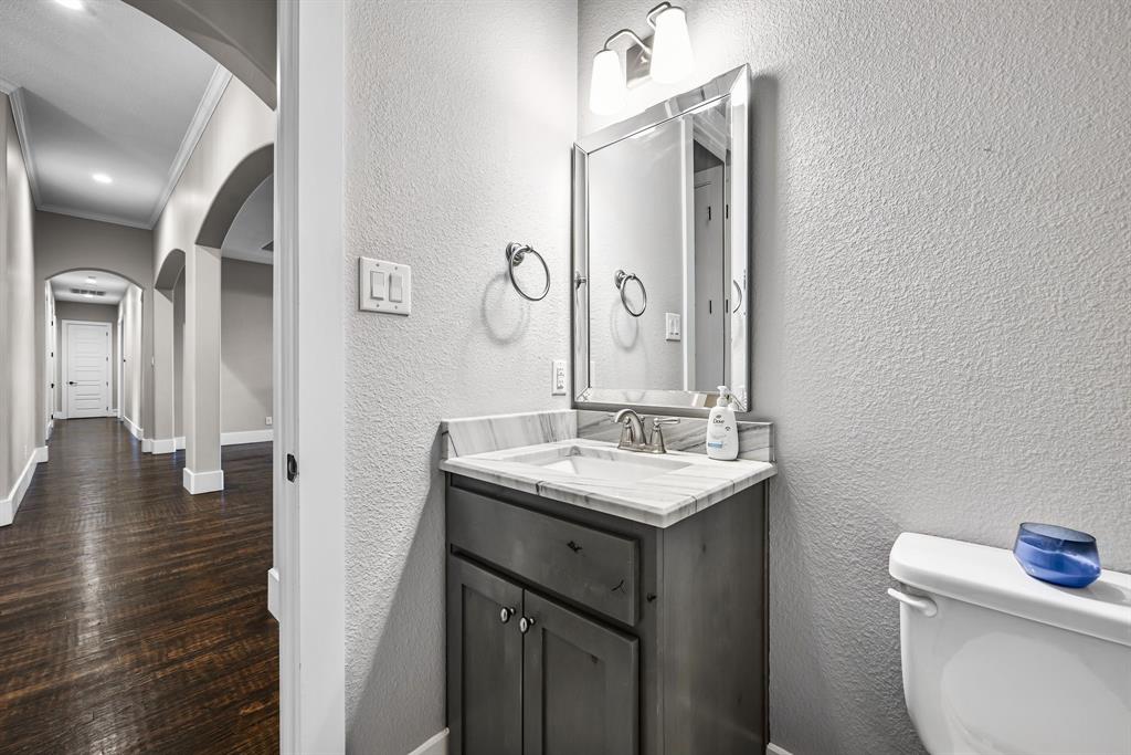 1070 Cornelius Road Rockwall, TX 75087 - Photo 19 of 33 Powder room just off the living room
