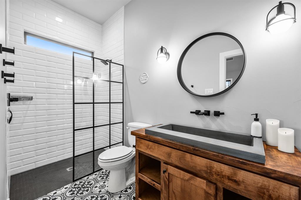 1070 Cornelius Road Rockwall, TX 75087 - Photo 30 of 33 Pool house full bathroom including a walk in shower.