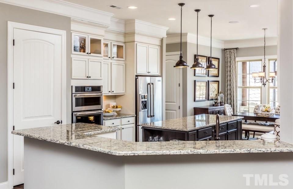 8432 Lentic Court Raleigh, NC 27615 - Photo 8 of 25 Gallery Image 8