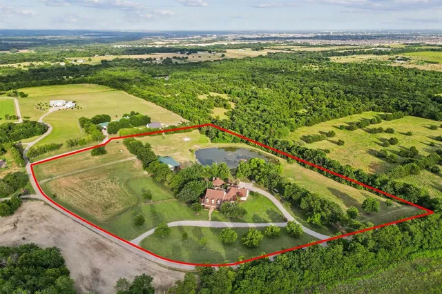 a view of a swimming pool with a garden