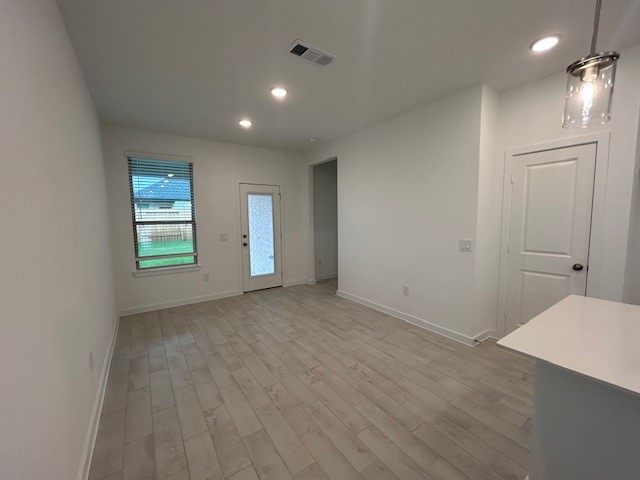 20811 Solaro Summit Trail Tomball, TX 77377 - Photo 10 of 19 wooden floor in an empty room with a window