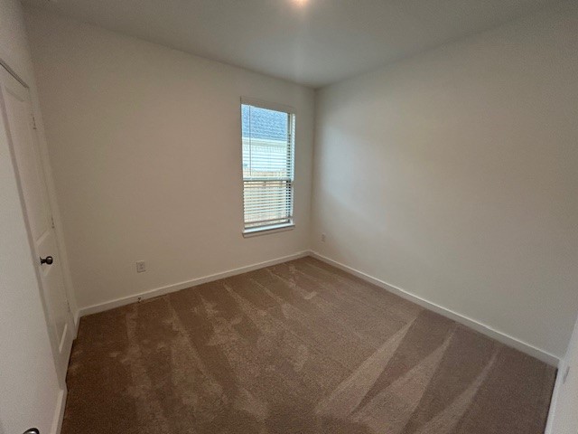 20811 Solaro Summit Trail Tomball, TX 77377 - Photo 15 of 19 an empty room with windows