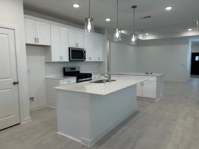 an empty room with an entryway