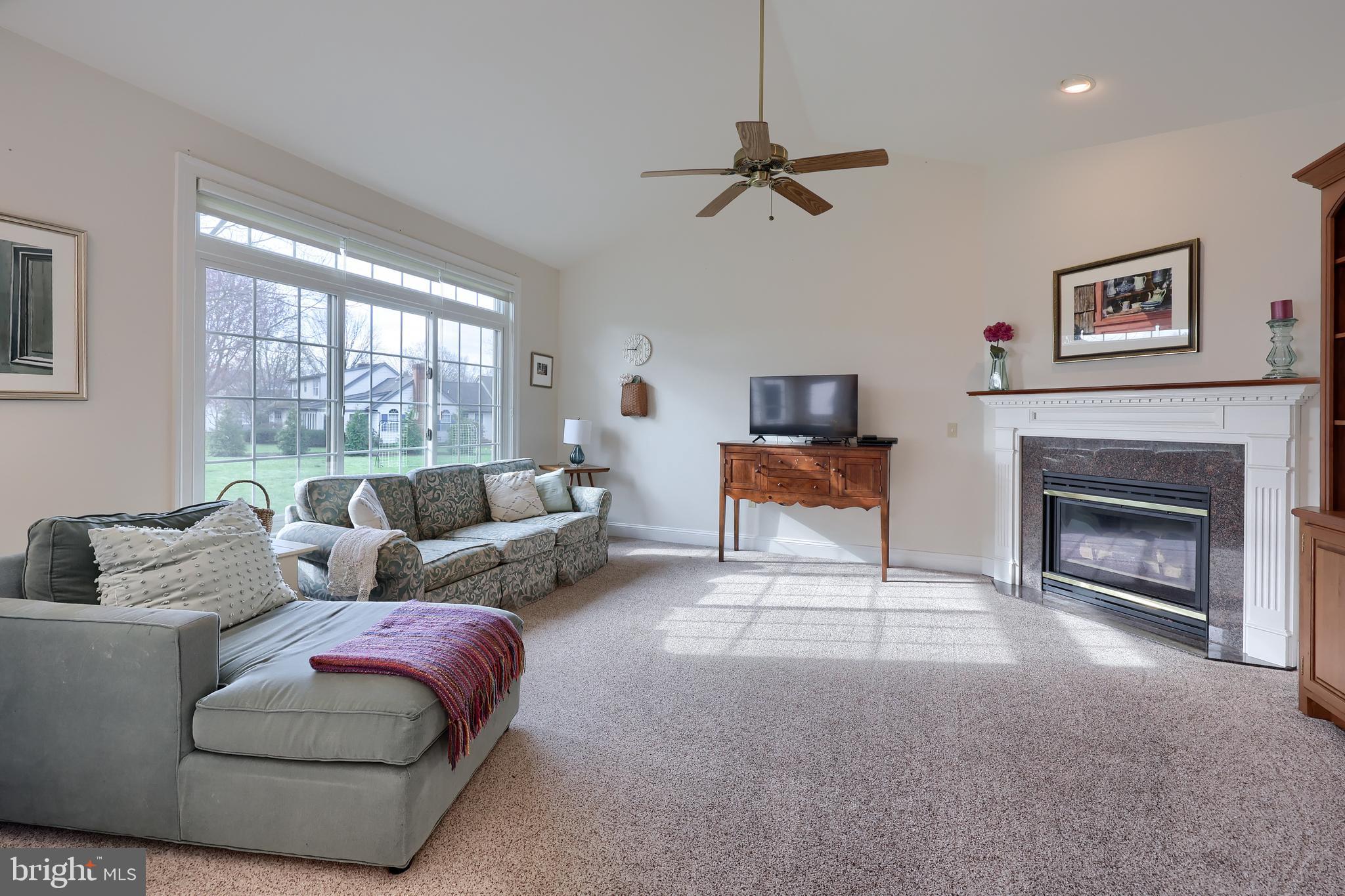 339 Harvest Drive Lititz, PA 17543 - Photo 14 of 69 a living room with furniture and a fireplace