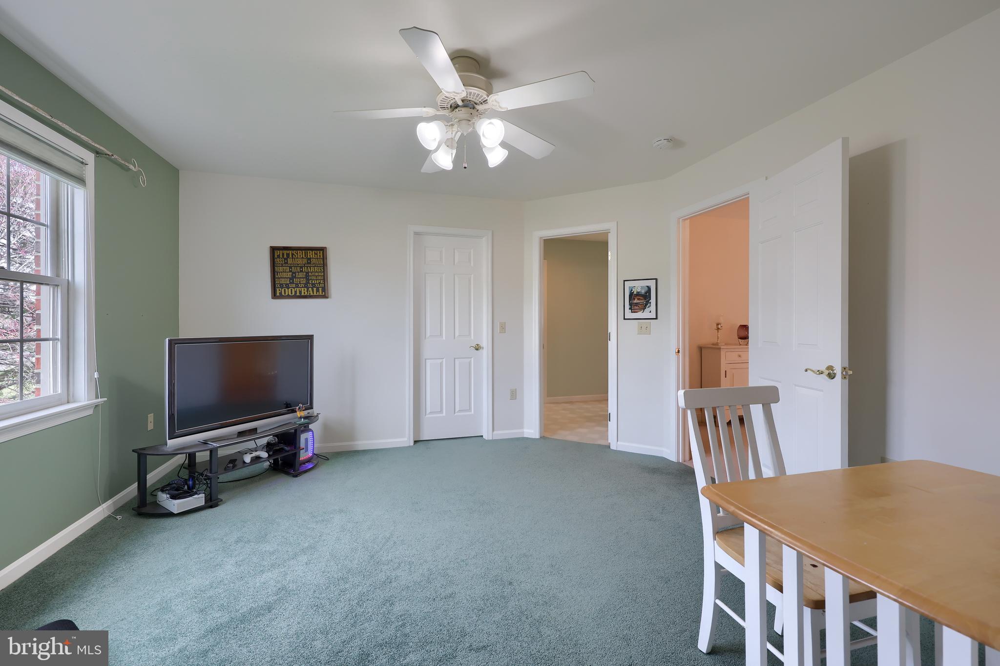 339 Harvest Drive Lititz, PA 17543 - Photo 41 of 69 a living room with furniture and a flat screen tv