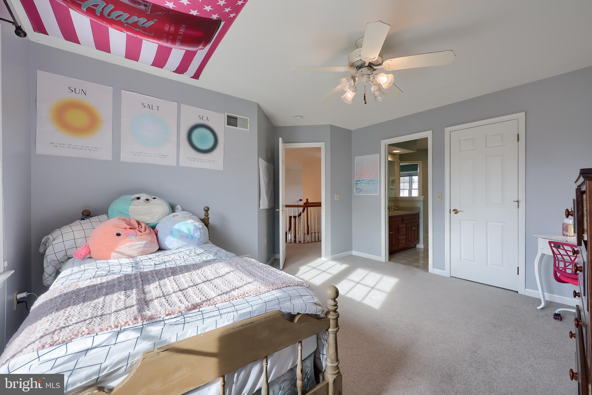 339 Harvest Drive Lititz, PA 17543 - Photo 45 of 69 a bedroom with a bed and a chandelier