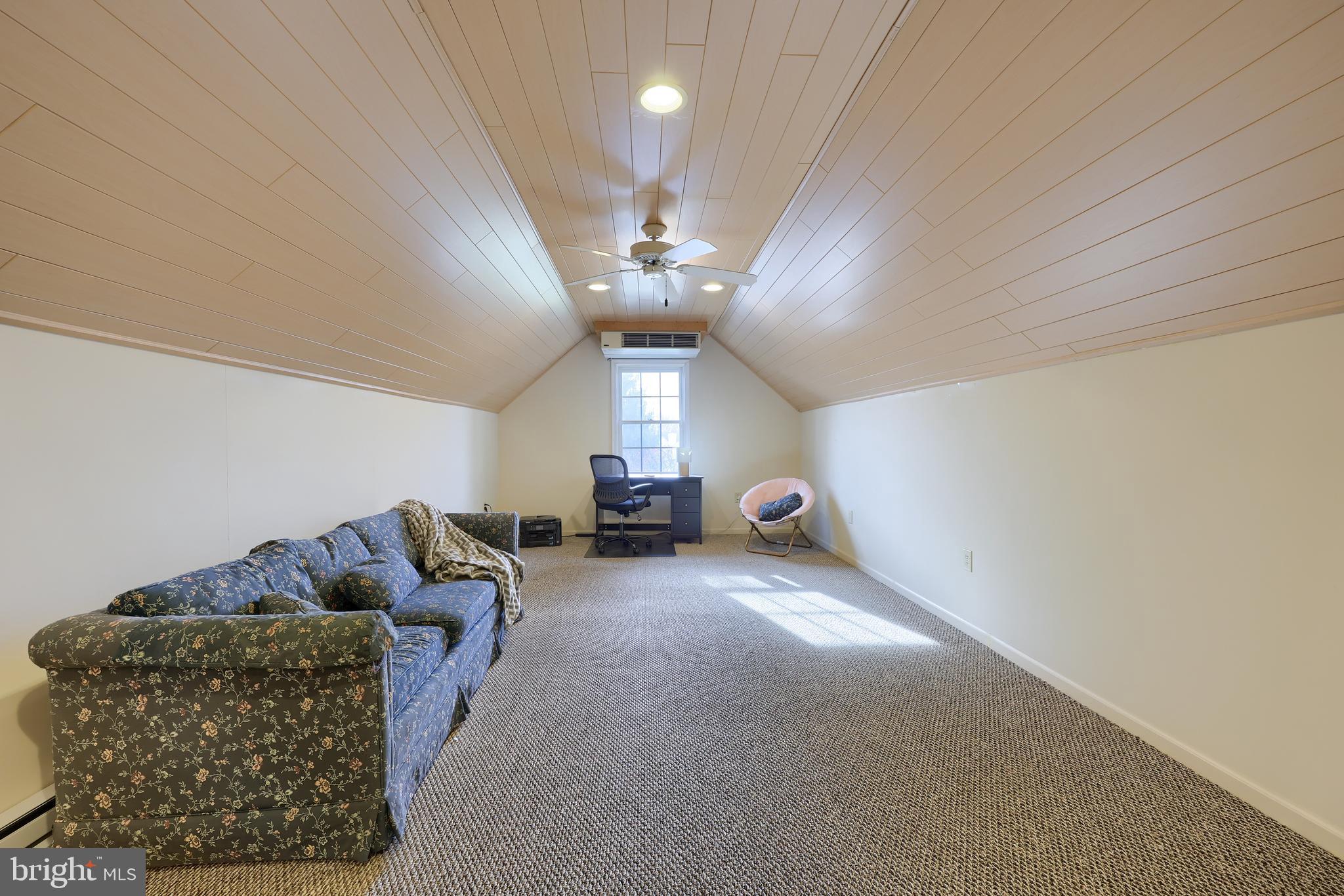 339 Harvest Drive Lititz, PA 17543 - Photo 51 of 69 a living room with furniture and a chandelier