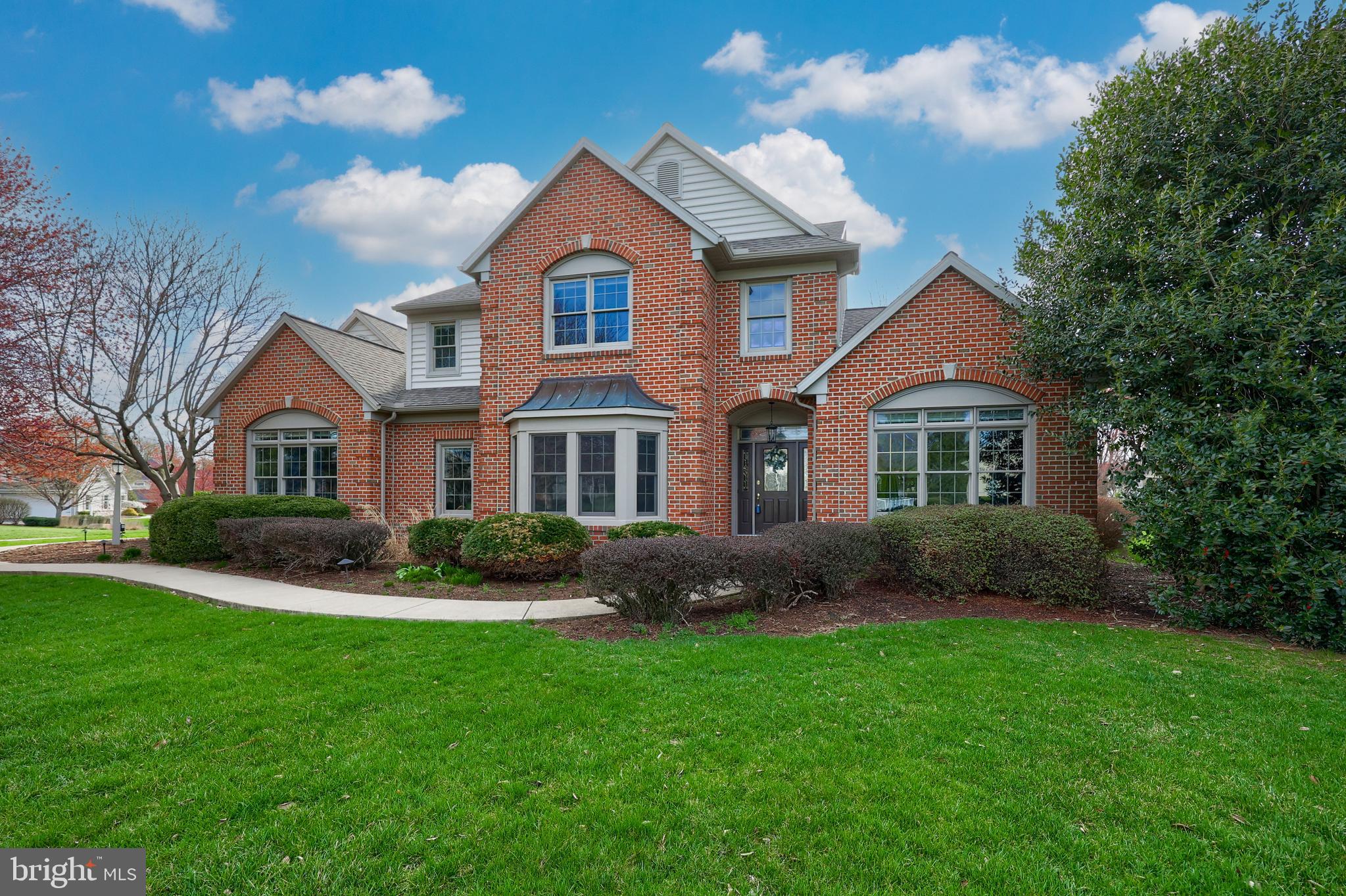 339 Harvest Drive Lititz, PA 17543 - Photo 54 of 69 a front view of a house with a yard and garage