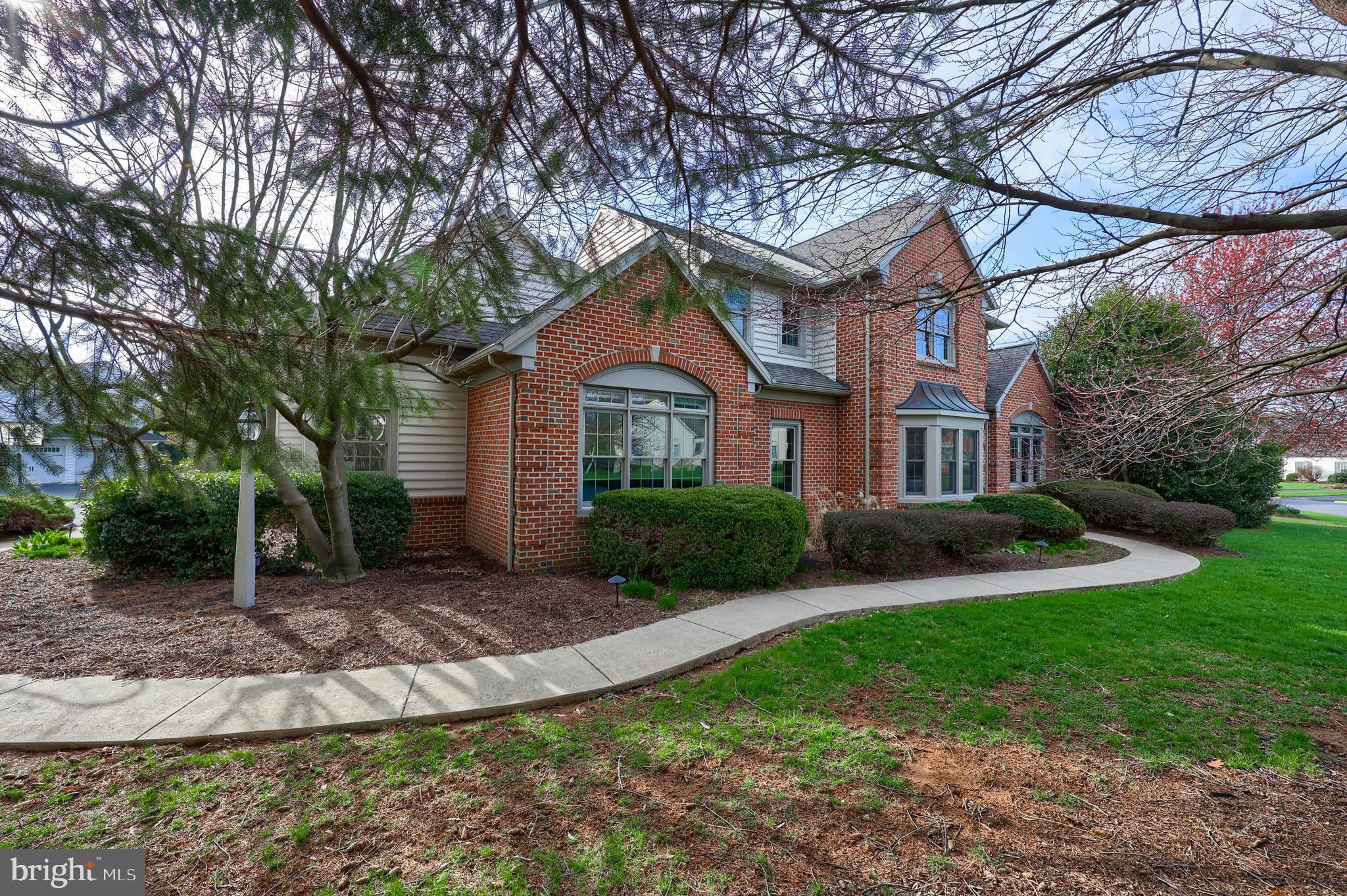 339 Harvest Drive Lititz, PA 17543 - Photo 56 of 69 a front view of a house with a yard and trees