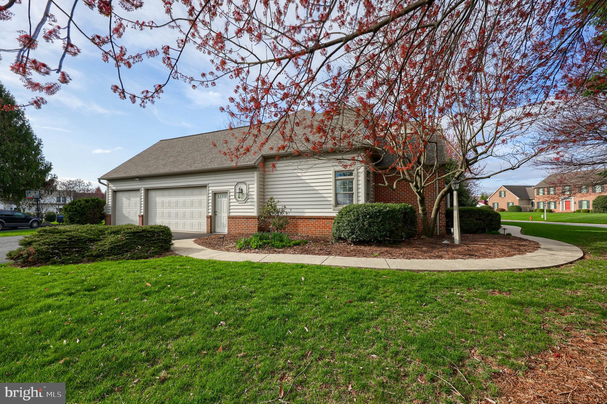 339 Harvest Drive Lititz, PA 17543 - Photo 58 of 69 a front view of a house with a yard and garage