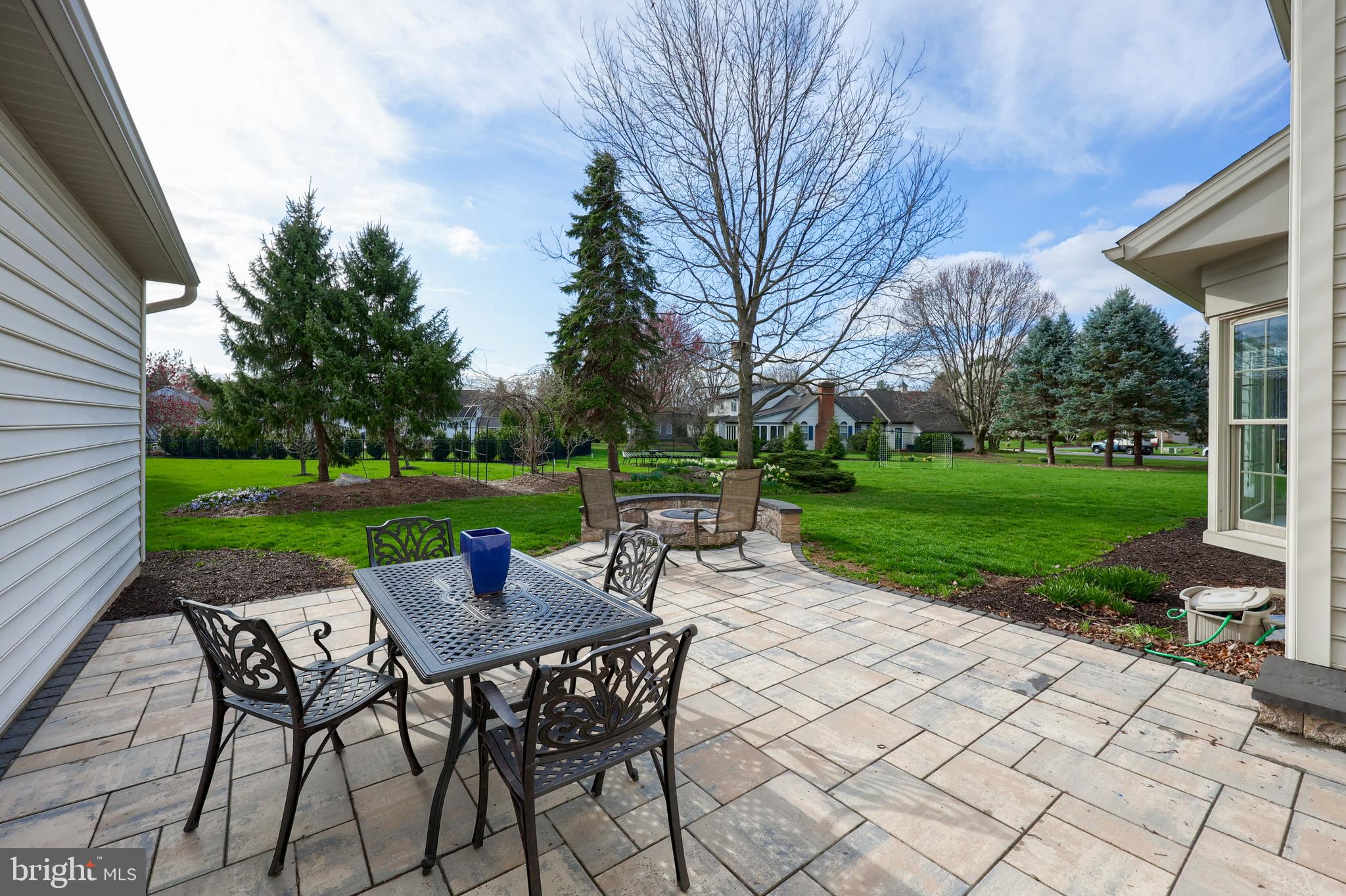 339 Harvest Drive Lititz, PA 17543 - Photo 67 of 69 a view of a chairs and table in backyard of the house