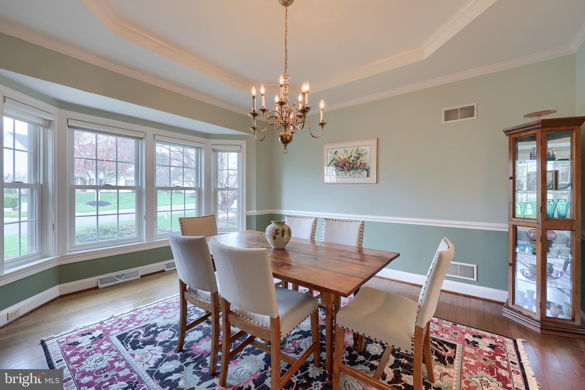 339 Harvest Drive Lititz, PA 17543 - Photo 7 of 69 a view of a dining room with furniture a rug and wooden floor