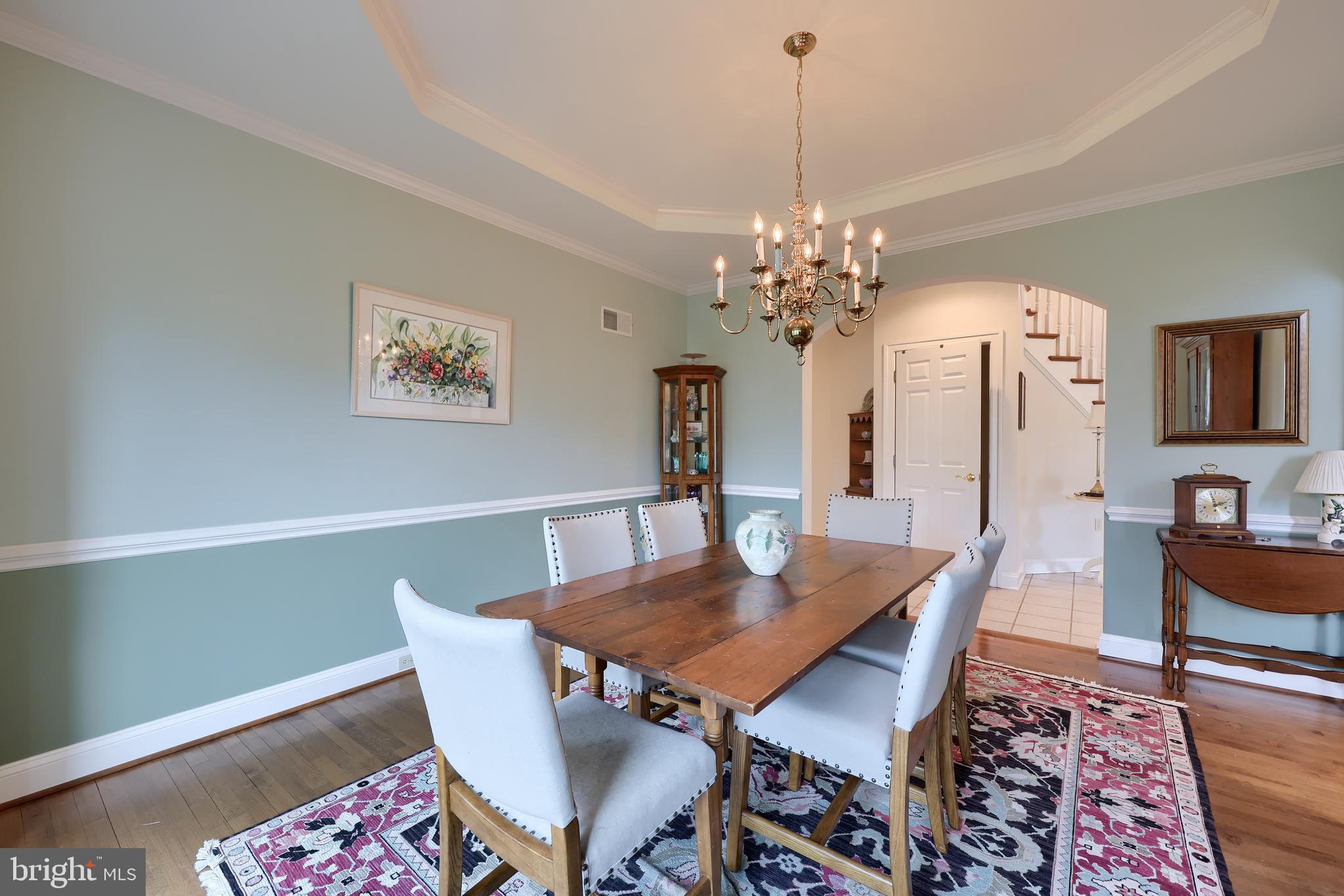 339 Harvest Drive Lititz, PA 17543 - Photo 8 of 69 a view of a dining room with furniture and wooden floor
