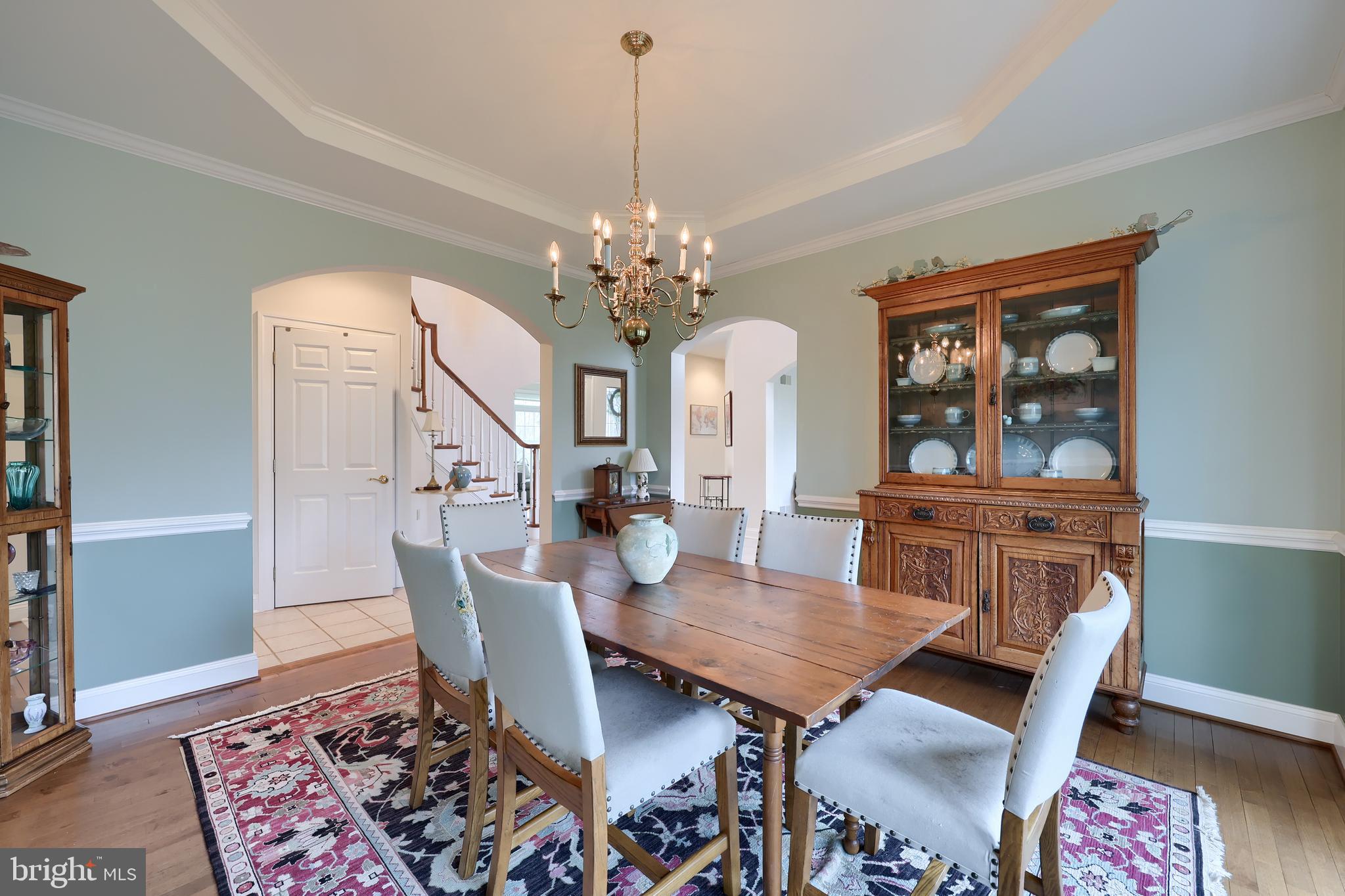 339 Harvest Drive Lititz, PA 17543 - Photo 9 of 69 a view of a dining room with furniture and wooden floor