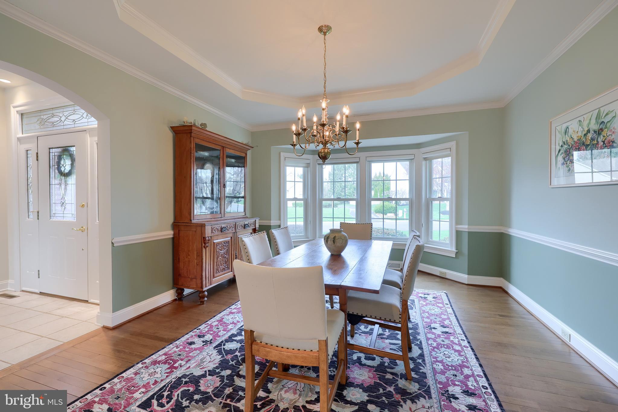 339 Harvest Drive Lititz, PA 17543 - Photo 10 of 69 a view of a dining room with furniture wooden floor and chandelier