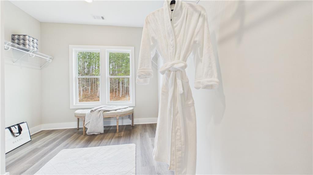 106 Neal Point Atlanta, GA 30349 - Photo 11 of 19 a living room with furniture and a large window