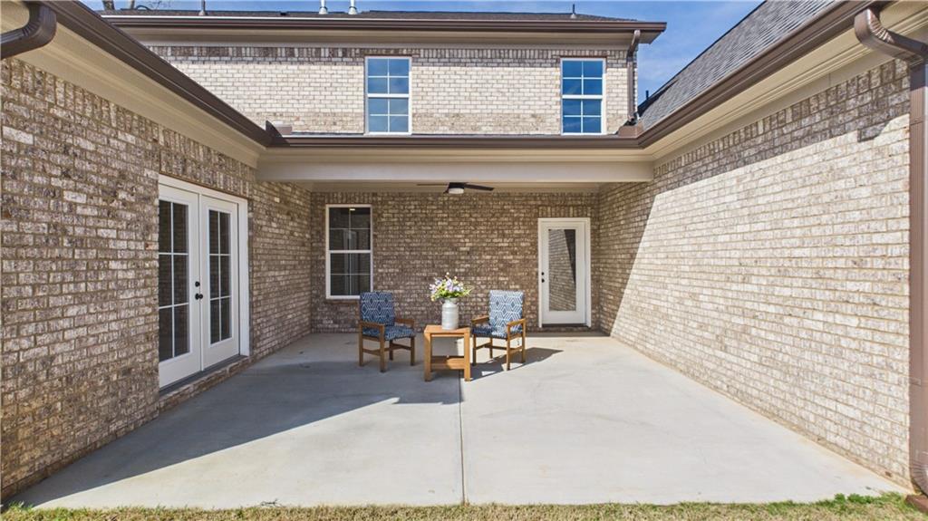 106 Neal Point Atlanta, GA 30349 - Photo 19 of 19 a view of a brick house with outdoor seating space