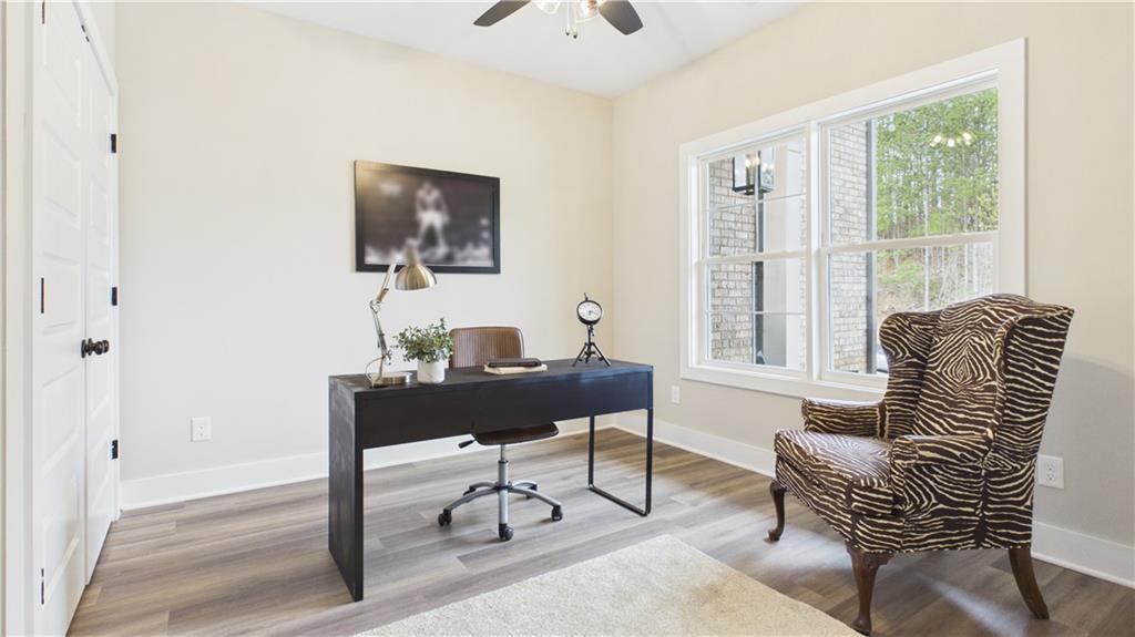 106 Neal Point Atlanta, GA 30349 - Photo 4 of 19 a view of a livingroom with furniture and a window
