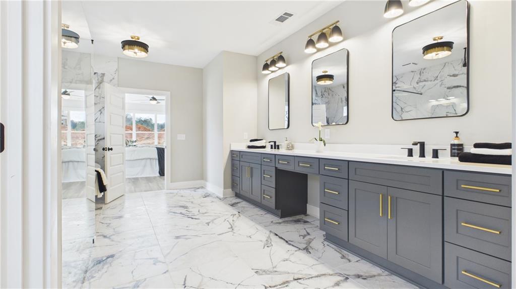 106 Neal Point Atlanta, GA 30349 - Photo 9 of 19 a spacious bathroom with a double vanity sink mirror and