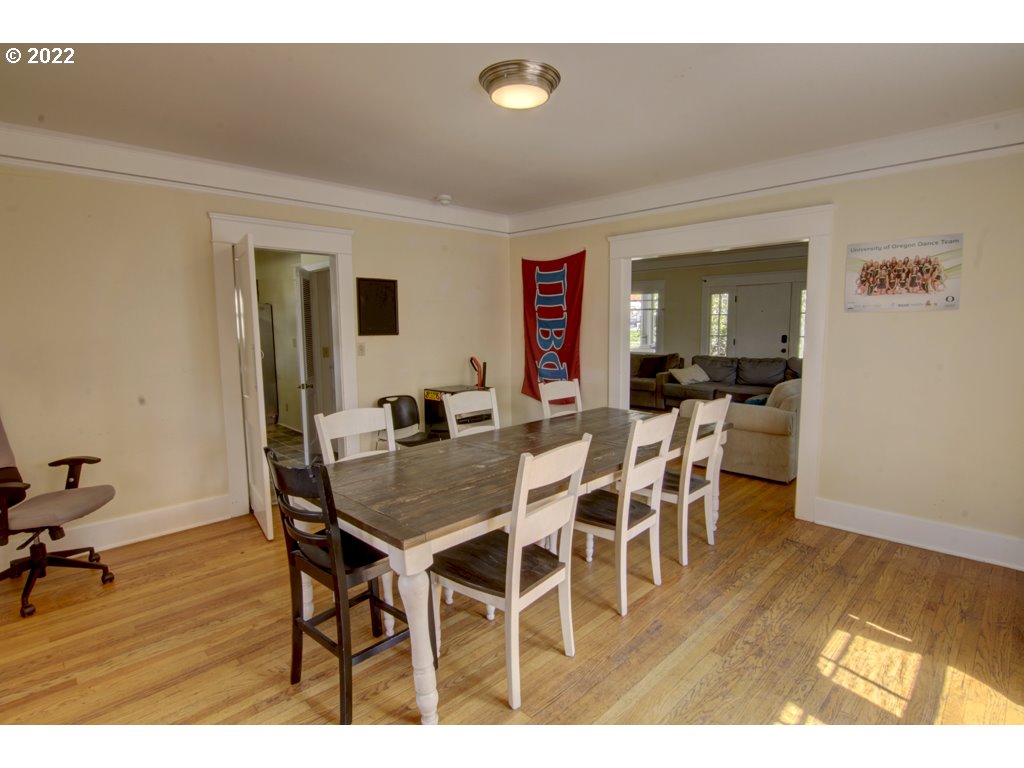 1926 Alder Street Eugene, OR 97405 - Photo 13 of 32 a view of a dining room with furniture and wooden floor