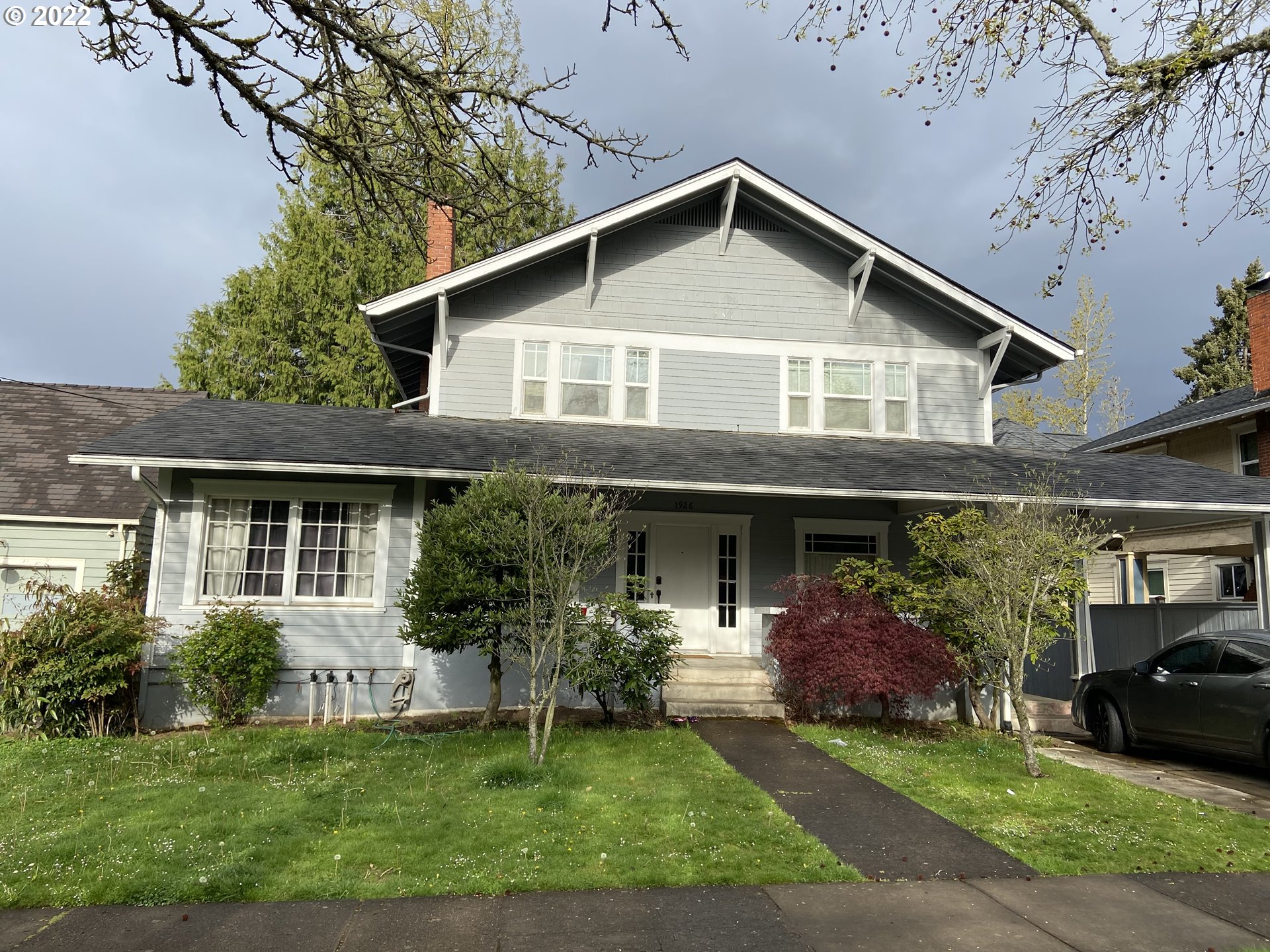 1926 Alder Street Eugene, OR 97405 - Photo 2 of 32 a front view of a house with a yard