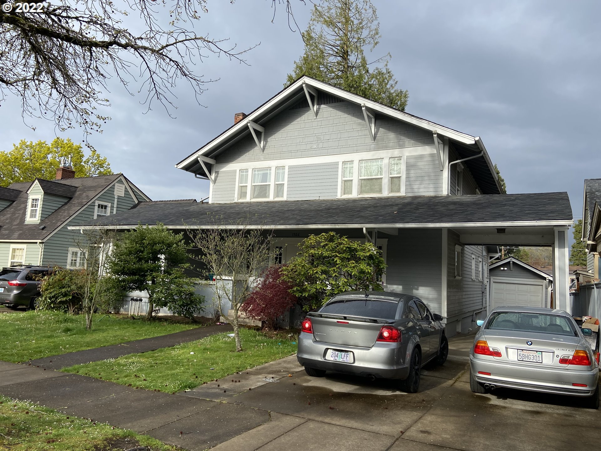 1926 Alder Street Eugene, OR 97405 - Photo 3 of 32 a front view of a house with garden
