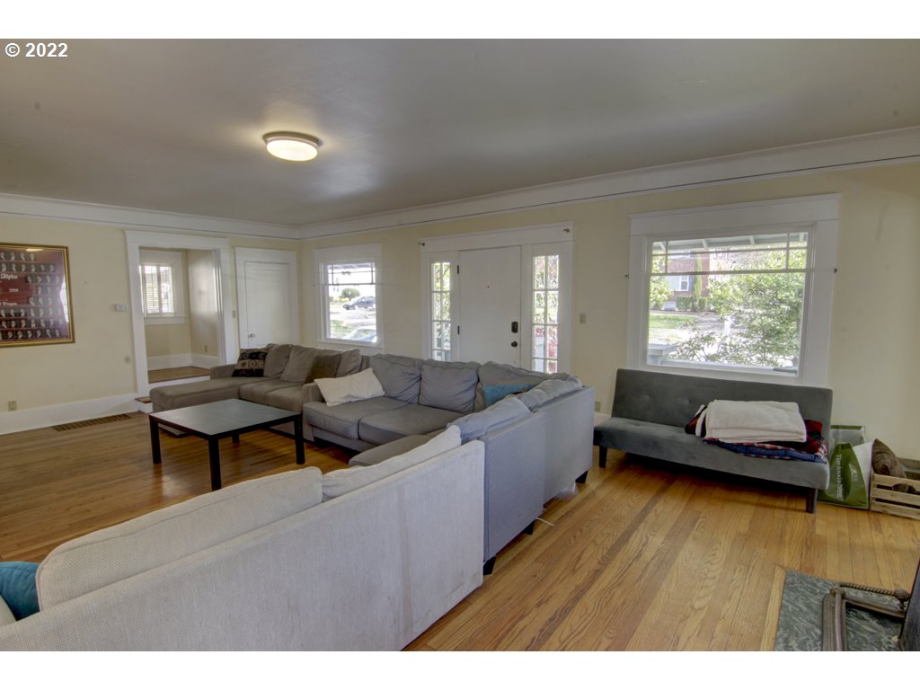 1926 Alder Street Eugene, OR 97405 - Photo 7 of 32 a living room with furniture and a wooden floor