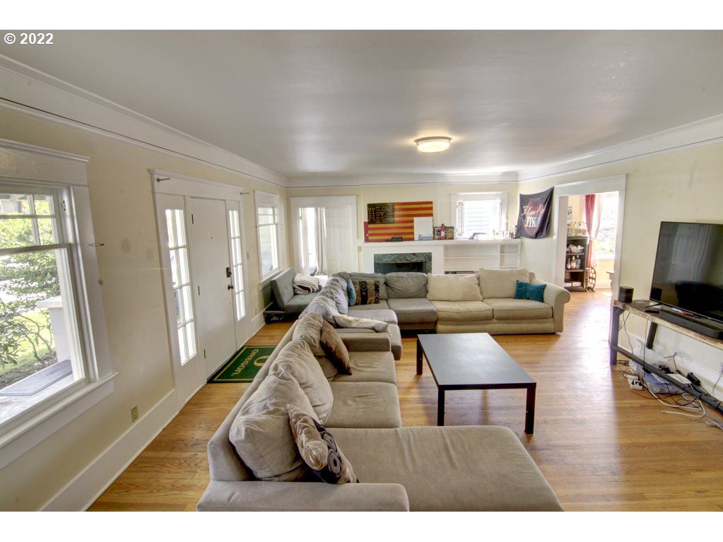 1926 Alder Street Eugene, OR 97405 - Photo 9 of 32 a living room with furniture and a flat screen tv