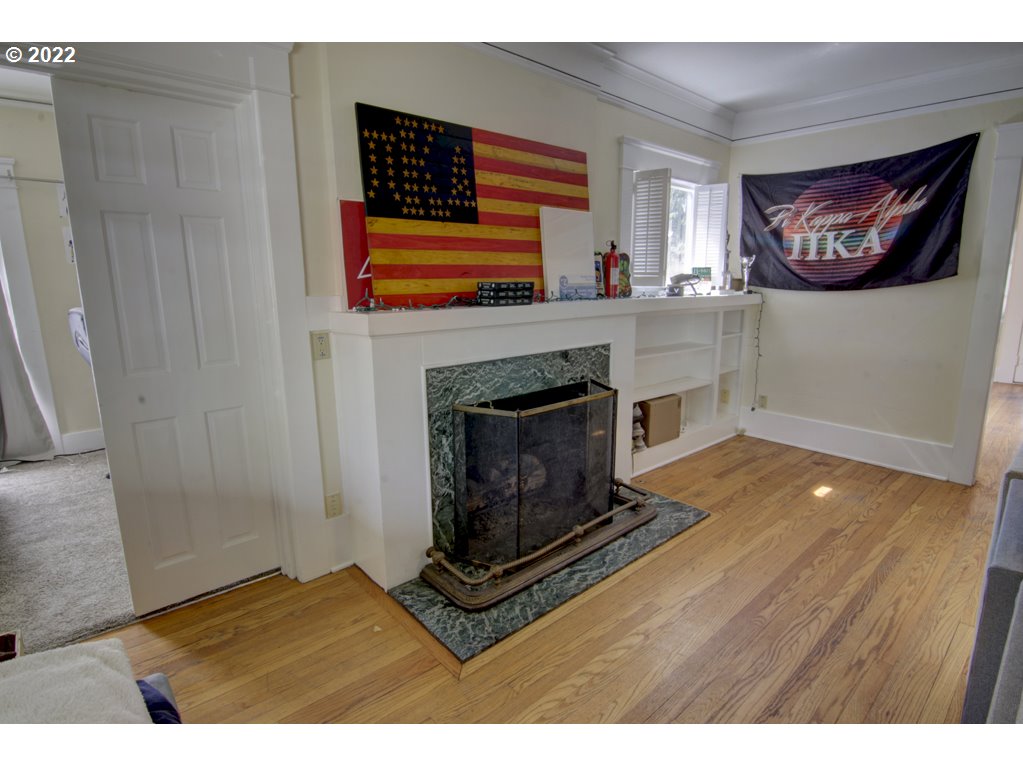 1926 Alder Street Eugene, OR 97405 - Photo 10 of 32 a living room with a fireplace