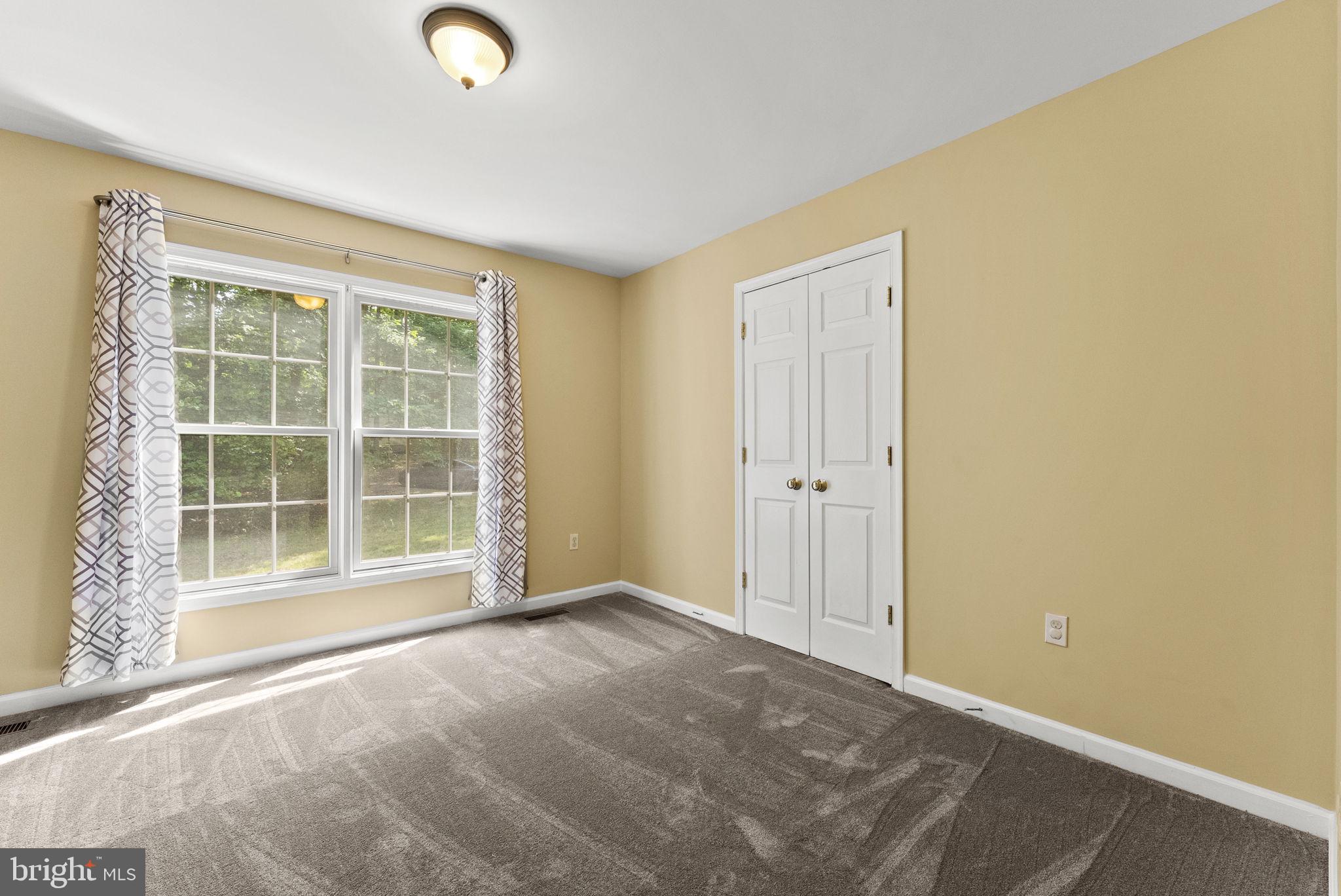 20065 Crooked Run Road Culpeper, VA 22701 - Photo 32 of 62 an empty room with windows
