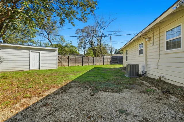 a view of a backyard with a garden