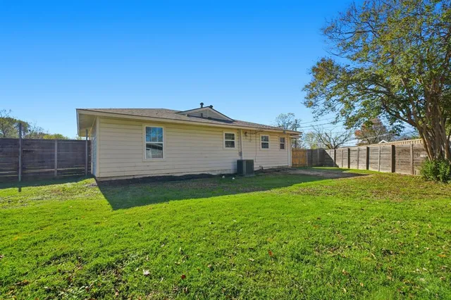 a view of a backyard with a garden