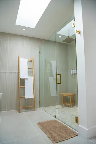 a room with furniture and potted plant