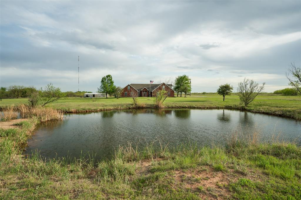 6101 Kovarik Road Wichita Falls, TX 76310 - Photo 33 of 40 a view of a lake with houses in the back