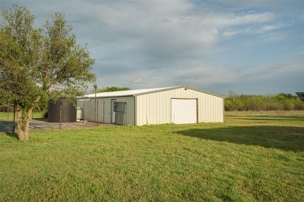 6101 Kovarik Road Wichita Falls, TX 76310 - Photo 38 of 40 a view of big yard next to a house with large trees