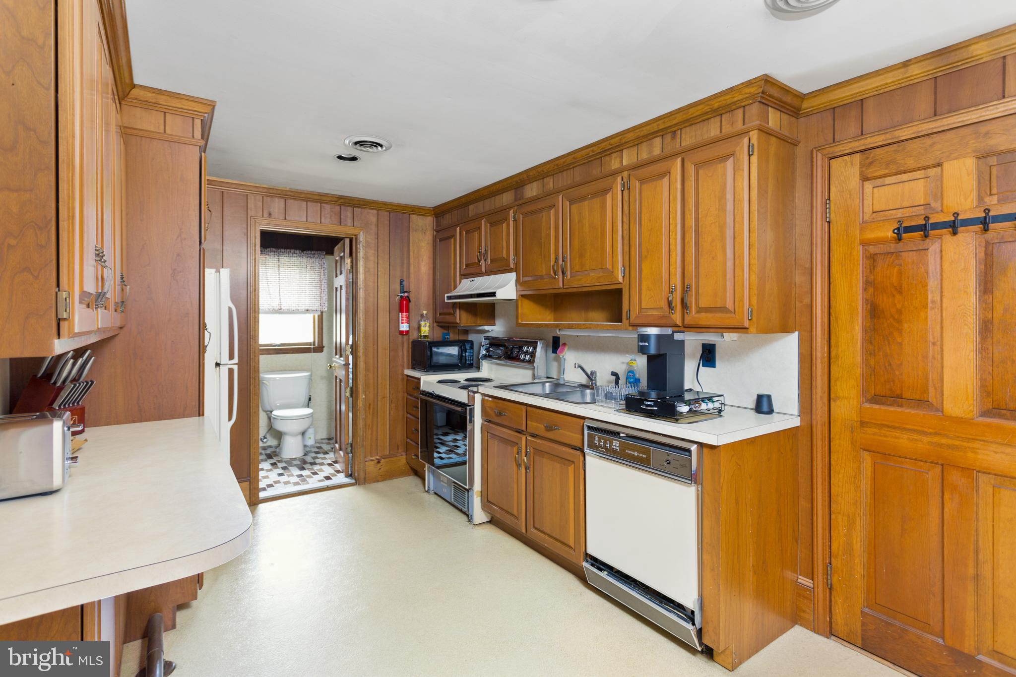 16 Archertown Road, Unit A New Egypt, NJ 08533 - Photo 3 of 13 a kitchen with a sink a stove and refrigerator