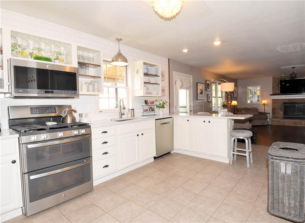 757 Chapel Road Aliquippa, PA 15001 - Photo 3 of 25 GORGEOUS WHITE CABINETRY TOPPED OFF WITH QUARTZ!