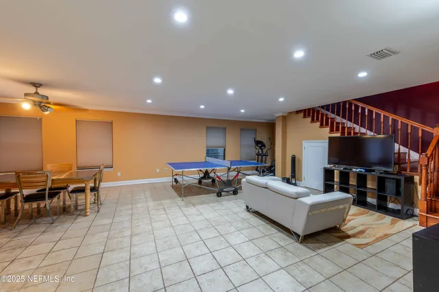 a room with table and chairs