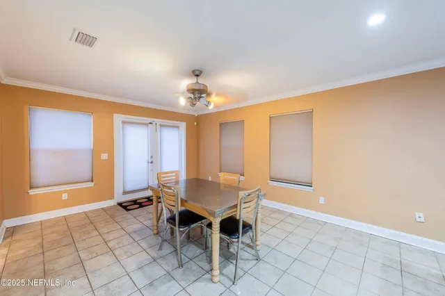 a kitchen with a stove a sink and a refrigerator