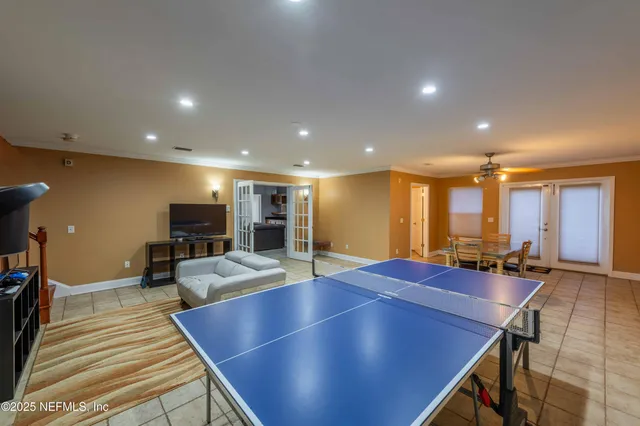 a view of a backyard with plants and a garden