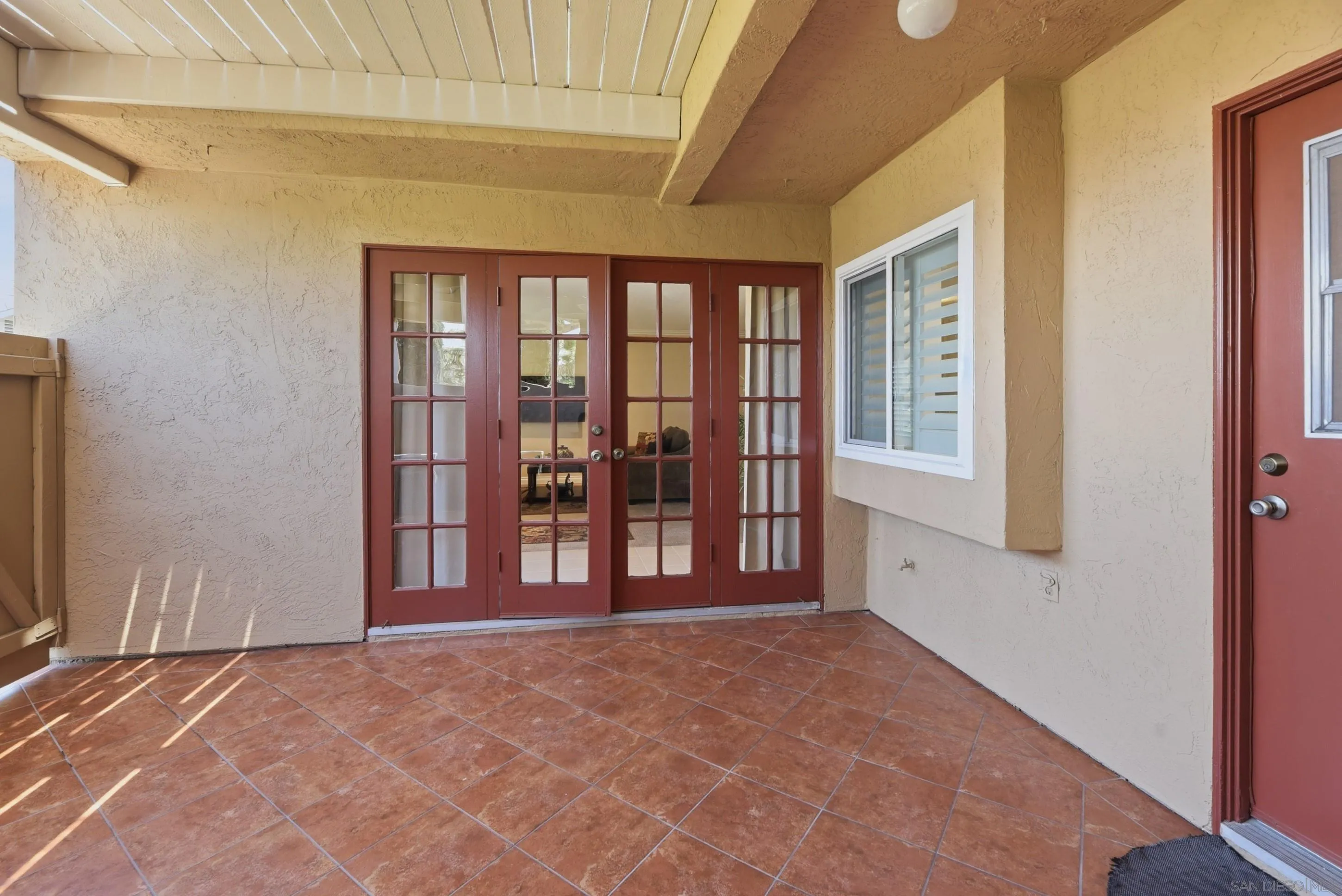 17443 Ashburton Road San Diego, CA 92128 - Photo 16 of 36 a view of an empty room with a window