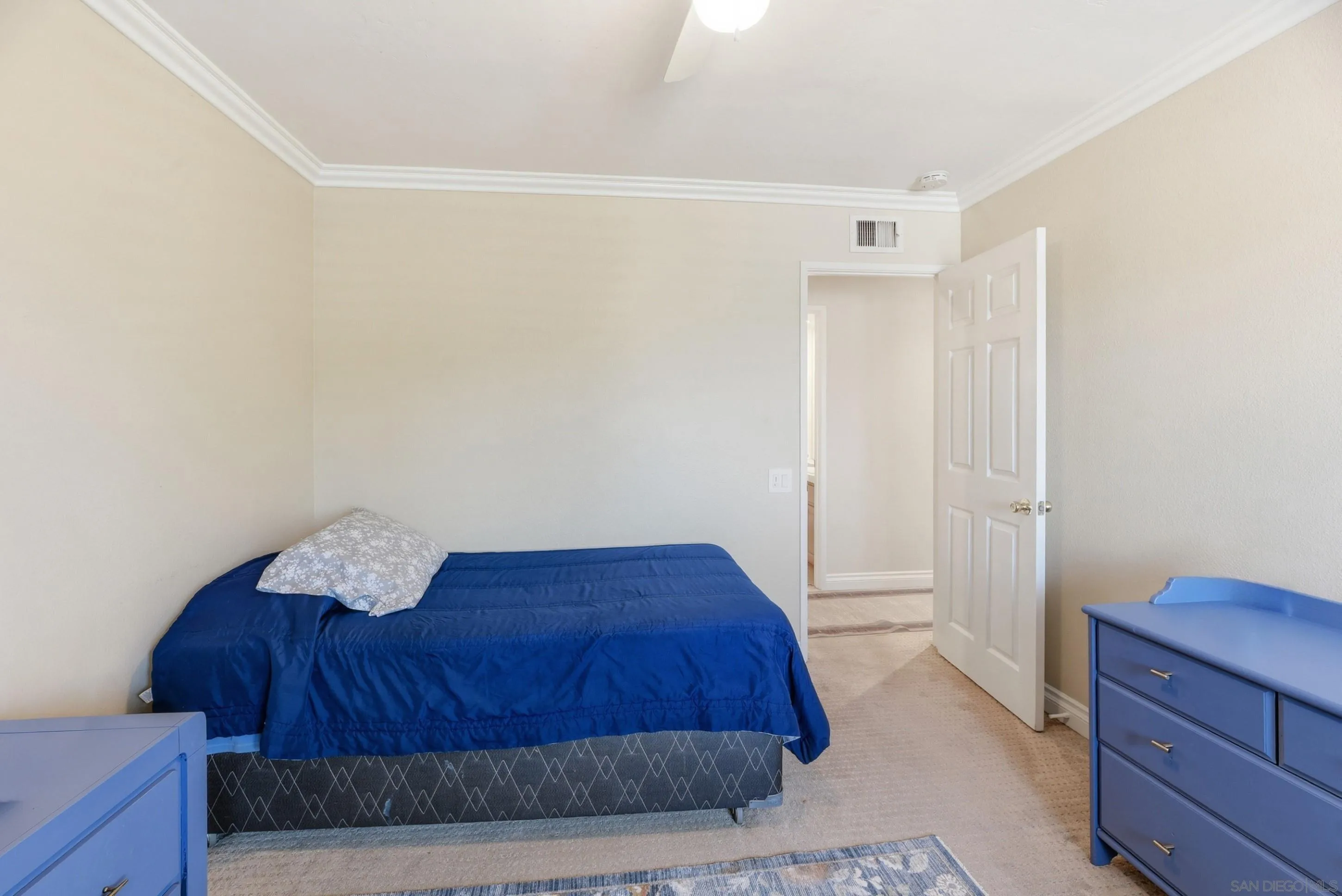 17443 Ashburton Road San Diego, CA 92128 - Photo 18 of 36 a bedroom with a bed and wooden floor
